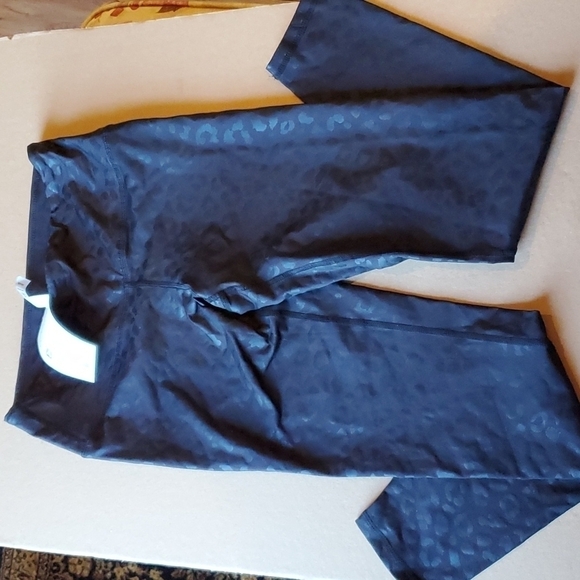 the Beauty Alley Pants - The beauty Alley black on black animal skin leggings NWT size large